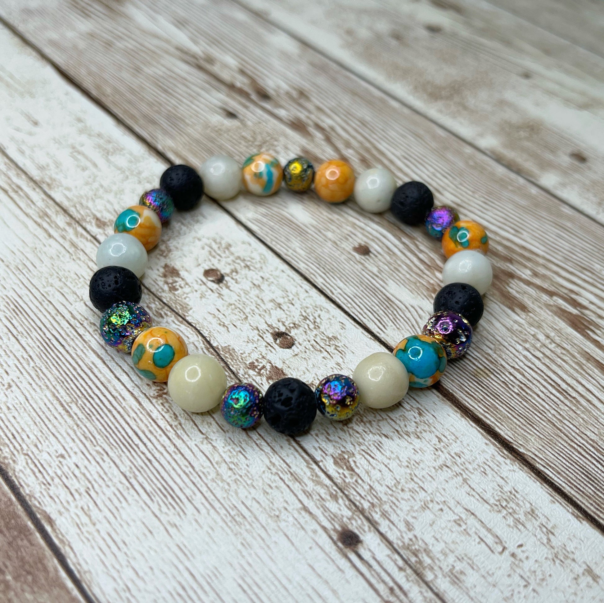 Grounding Lava Kids Essential Oil Bracelet — bird's tail designs